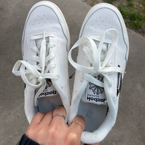 white Reebok sneakers